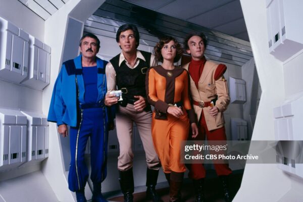 LOS ANGELES - JANUARY 1: (Pictured left to right) James Doohan (as Commander Canarvin); Craig Littler (as Jason); Susan Pratt, aka: Susan O'Hanlon (as Captain Nicole Davidoff); and Charlie Dell (as Professor E.J. Parsafoot) star on "Jason of Star Command", a CBS Saturday morning live action science fiction television program. Image dated: January 1, 1979. Los Angeles, CA. (Photo by CBS via Getty Images)